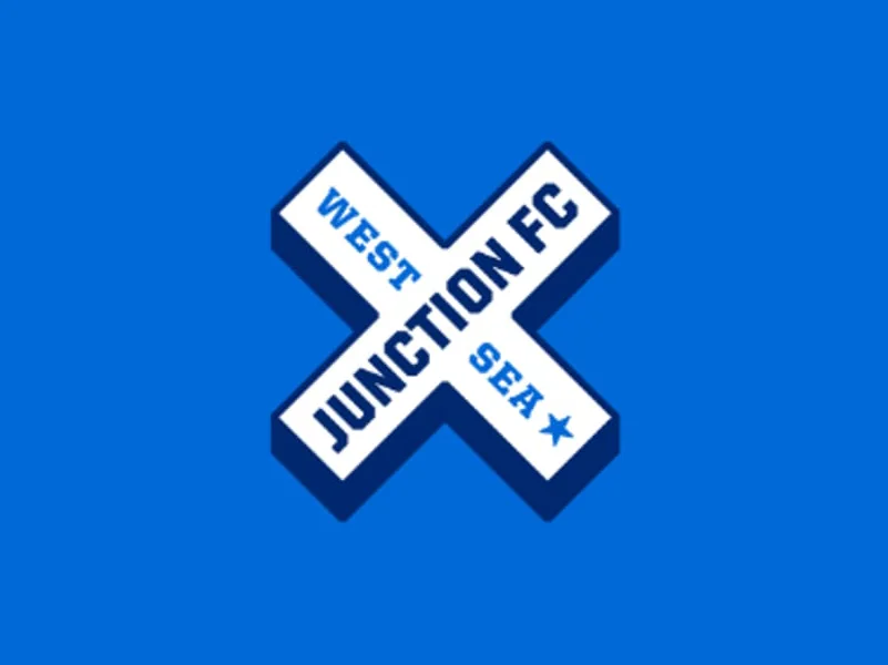 A blue X-shaped logo with "Junction FC" across and "West" and "Sea" on the arms, on a blue background.